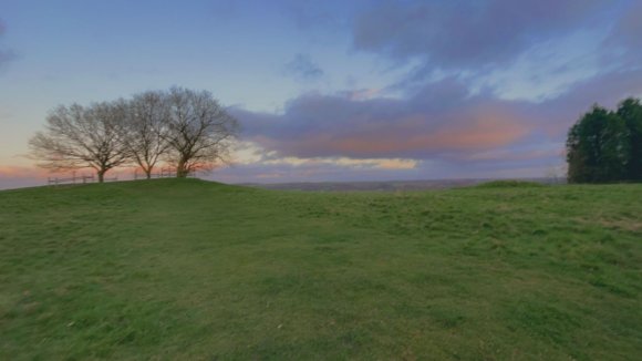 Trees on Bunkers Hill under a dramatic sky